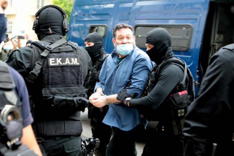 Ο ευρωβουλευτής  Γιάννης Λαγός που εκδόθηκε από τις βελγικές Αρχές μετά από ένταλμα της Ελλάδας, οδηγείται στον Εισαγγελέα Εκτέλεσης Ποινών (φωτ.: ΑΠΕ-ΜΠΕ /Παντελής Σαΐτας)