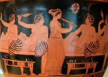 Σκηνή από συμπόσιο. Οι συνδαιτημόνες παίζουν κότταβο ενώ μία κοπέλα παίζει αυλό. Αττικός ερυθρόμορφος κρατήρας, Εθνικό Αρχαιολογικό Μουσείο της Μαδρίτης, 420 π.Χ. περίπου (πηγή: el.wikipedia.org)