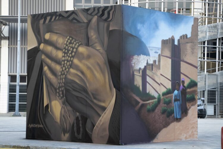 Τρίπτυχο γκράφιτι 27 τετραγωνικών μέτρων στη ΔΕΘ για τα 100 χρόνια από τη Μικρασιατική Καταστροφή (Φωτ. ΑΠΕ-ΜΠΕ)