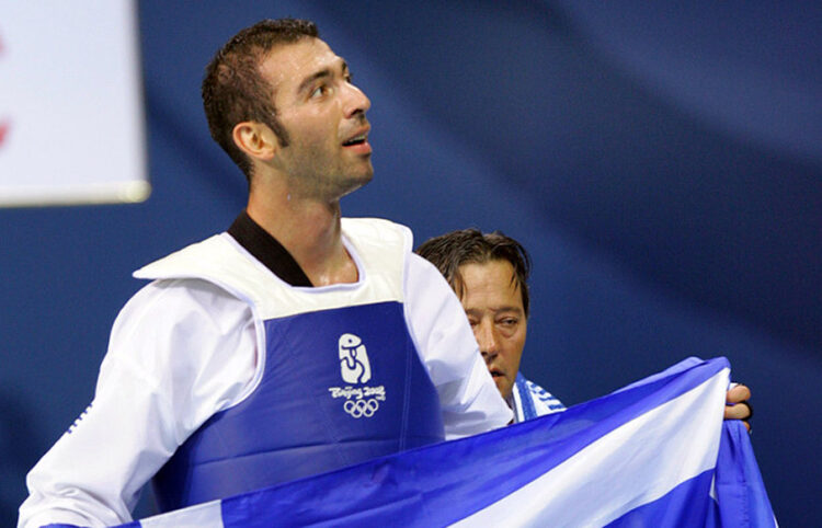 Ο Αλέξανδρος Νικολαΐδης μετά τη νίκη στους Ολυμπιακούς Αγώνες του 2008 στο Πεκίνο (φωτ.: ΑΠΕ-ΜΠΕ / Συμέλα Παντζαρτζή)