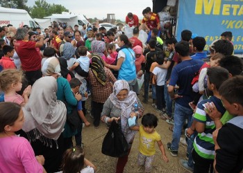 Еврокомиссия требует от G20 равного распределения беженцев