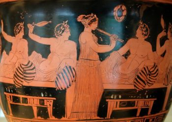 Σκηνή από συμπόσιο. Οι συνδαιτημόνες παίζουν κότταβο ενώ μία κοπέλα παίζει αυλό. Αττικός ερυθρόμορφος κρατήρας, Εθνικό Αρχαιολογικό Μουσείο της Μαδρίτης, 420 π.Χ. περίπου (πηγή: el.wikipedia.org)