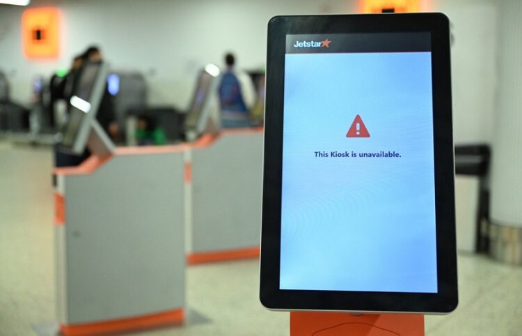 Σύστημα της αεροπορικής εταιρείας Jetstar εκτός λειτουργίας, στο αεροδρόμιο της Μελβούρνης (φωτ.: EPA / James Ross Australia And New Zealand Out)