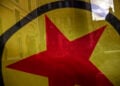 Το λάβαρο του Εργατικού Κόμματος του Κουρδιστάν (PKK) κατά τη διάρκεια διαδήλωσης (φωτ. αρχείου: EPA/Riccardo Antimiani)