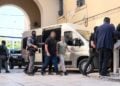 Ορισμένοι από τους κατηγορούμενους ενώ οδηγούνται στον εισαγγελέα (φωτ.: EUROKINISSI)