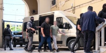 Ορισμένοι από τους κατηγορούμενους ενώ οδηγούνται στον εισαγγελέα (φωτ.: EUROKINISSI)