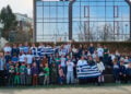 Μαθητές ελληνικής καταγωγής του International European School της Βαρσοβίας τιμούν την 25η Μαρτίου με παρέλαση, παραδοσιακούς χορούς και μουσική (φωτ.: International European School Warsaw)
