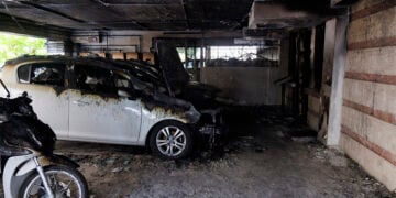 Η καμένη πιλοτή της πολυκατοικίας όπου διαμένει η οικογένεια Νέστορα, στην περιοχή της Ανάληψης (Χαριλάου) στη Θεσσαλονίκη. Τετάρτη 1 Ιουλίου 2026 (φωτ.: ΑΠΕ-ΜΠΕ / Αχιλλέας Χήρας)