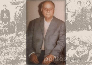 Ο παππούς Ζαχαρίας με φόντο οικογένεια προσφύγων στην Καλαμαριά (εικ.: ΧΚ)