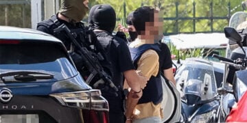 Συλληφθείς για το εμπρησμό της Marfin οδηγείται ενώπιον  της 3ης τακτικής ανακρίτριας. Τρίτη 14 Ιουλίου 2026 (φωτ.: EUROKINISSI)